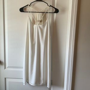 White dress. Slight Discoloration, and Pull